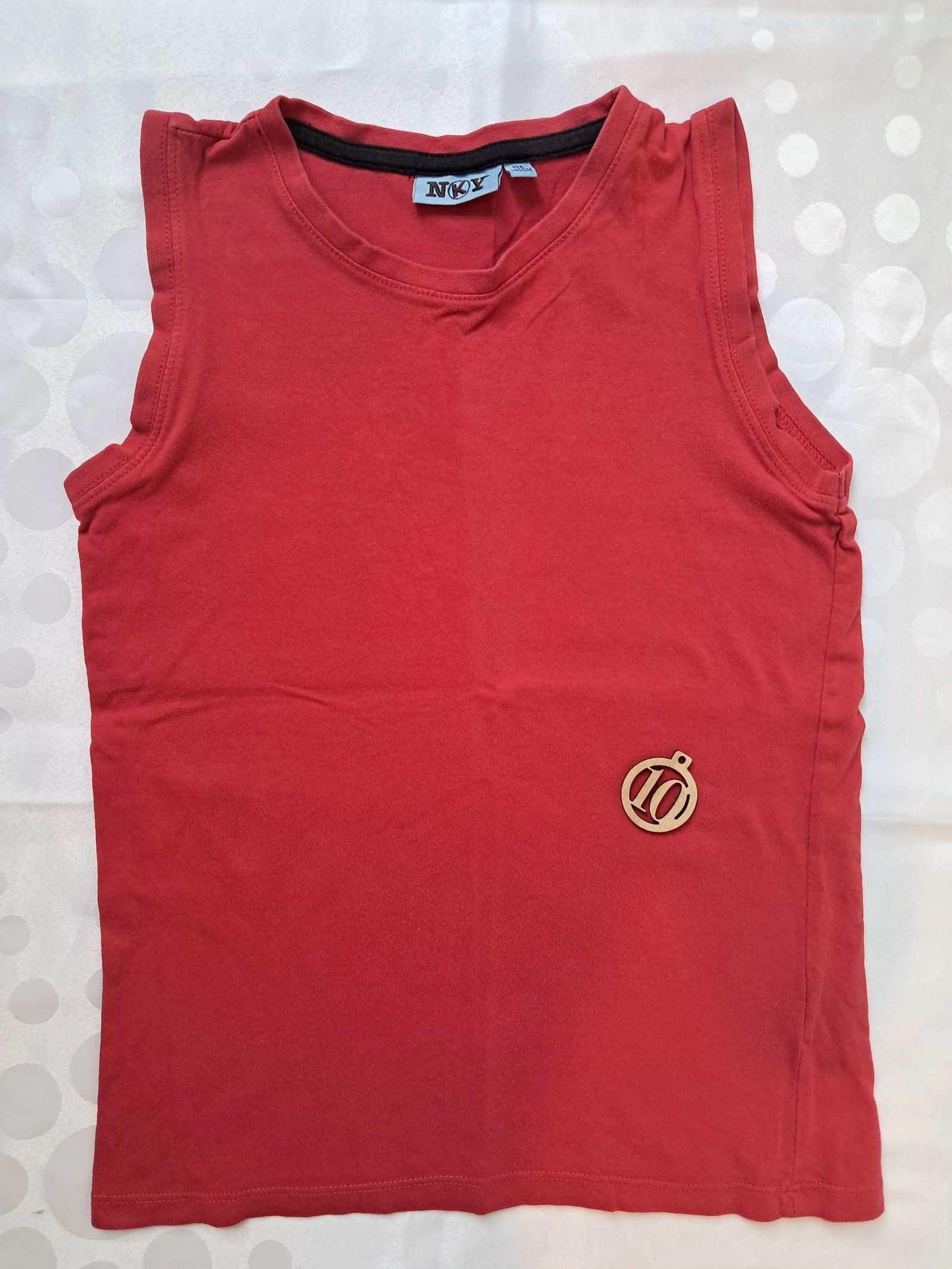 Débardeur rouge taille 10ans 140cm